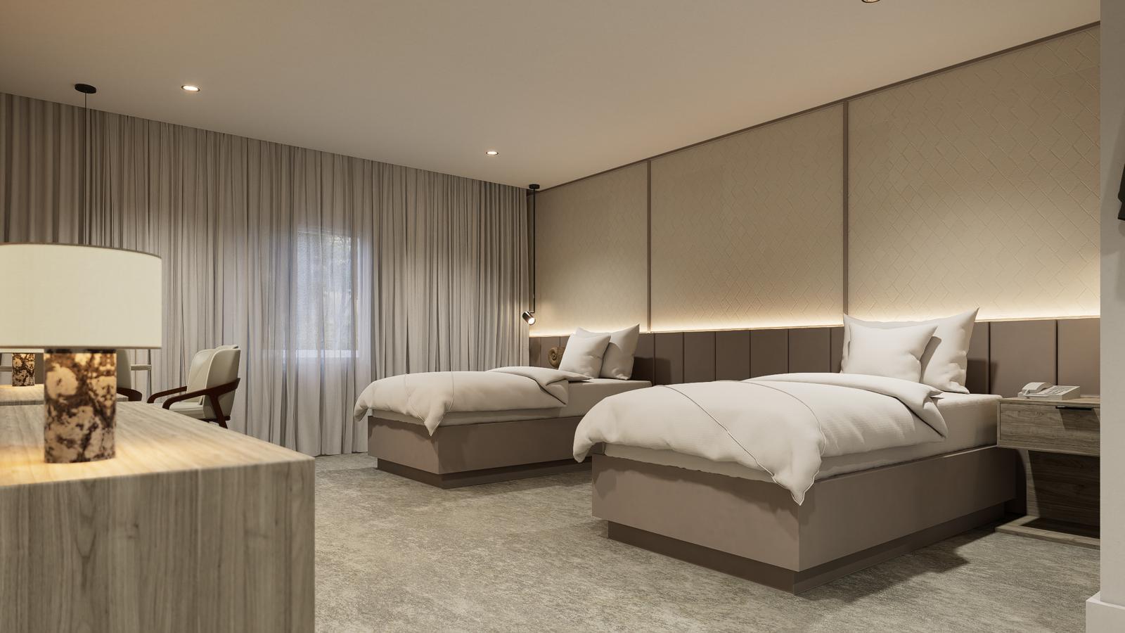 Twin suite with quilted upholstered headboard wall, cove lighting and stone-cylinder lamp