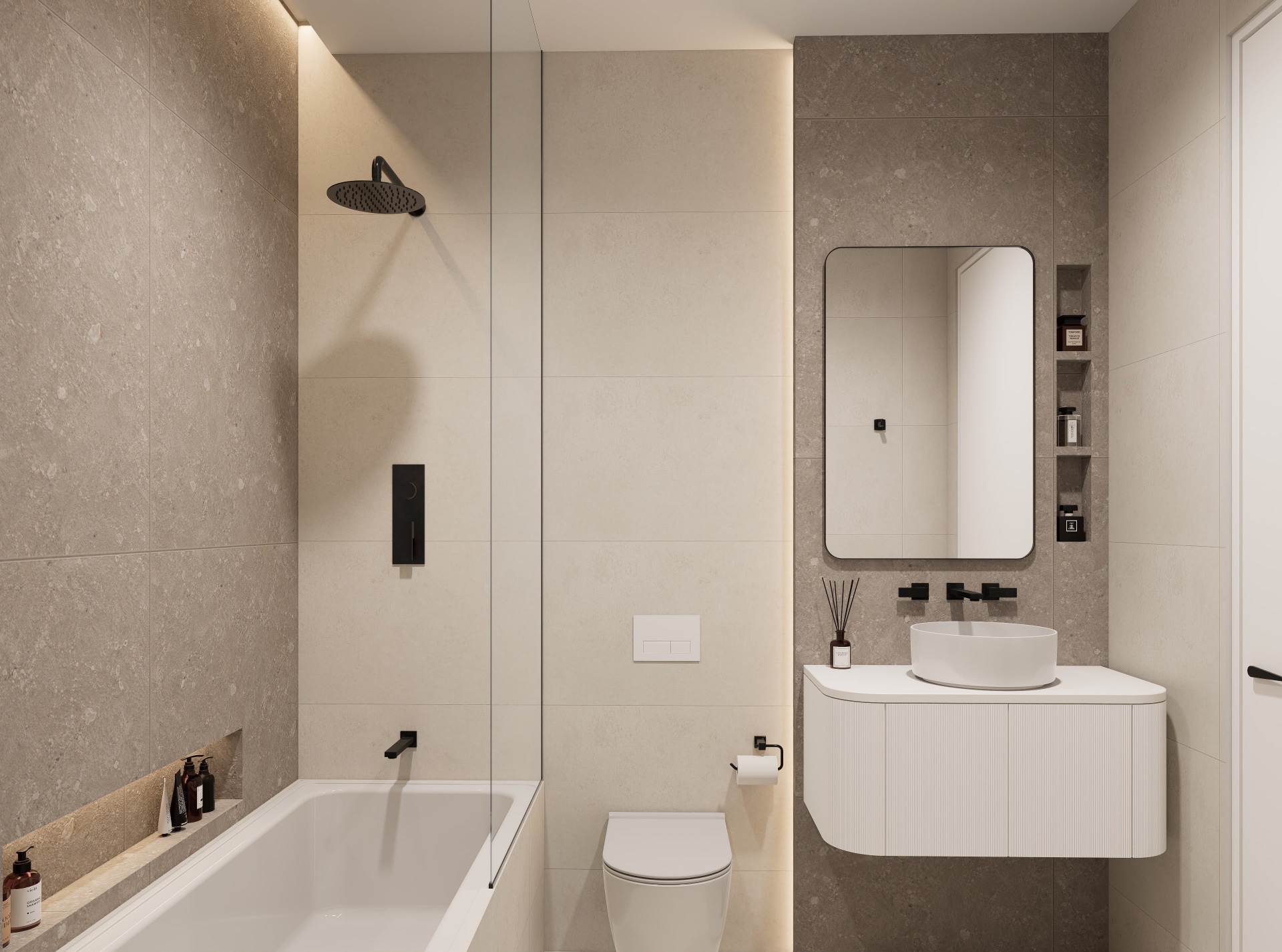 Bathroom with stone-look tile, glass tub screen, black fittings and curved fluted vanity