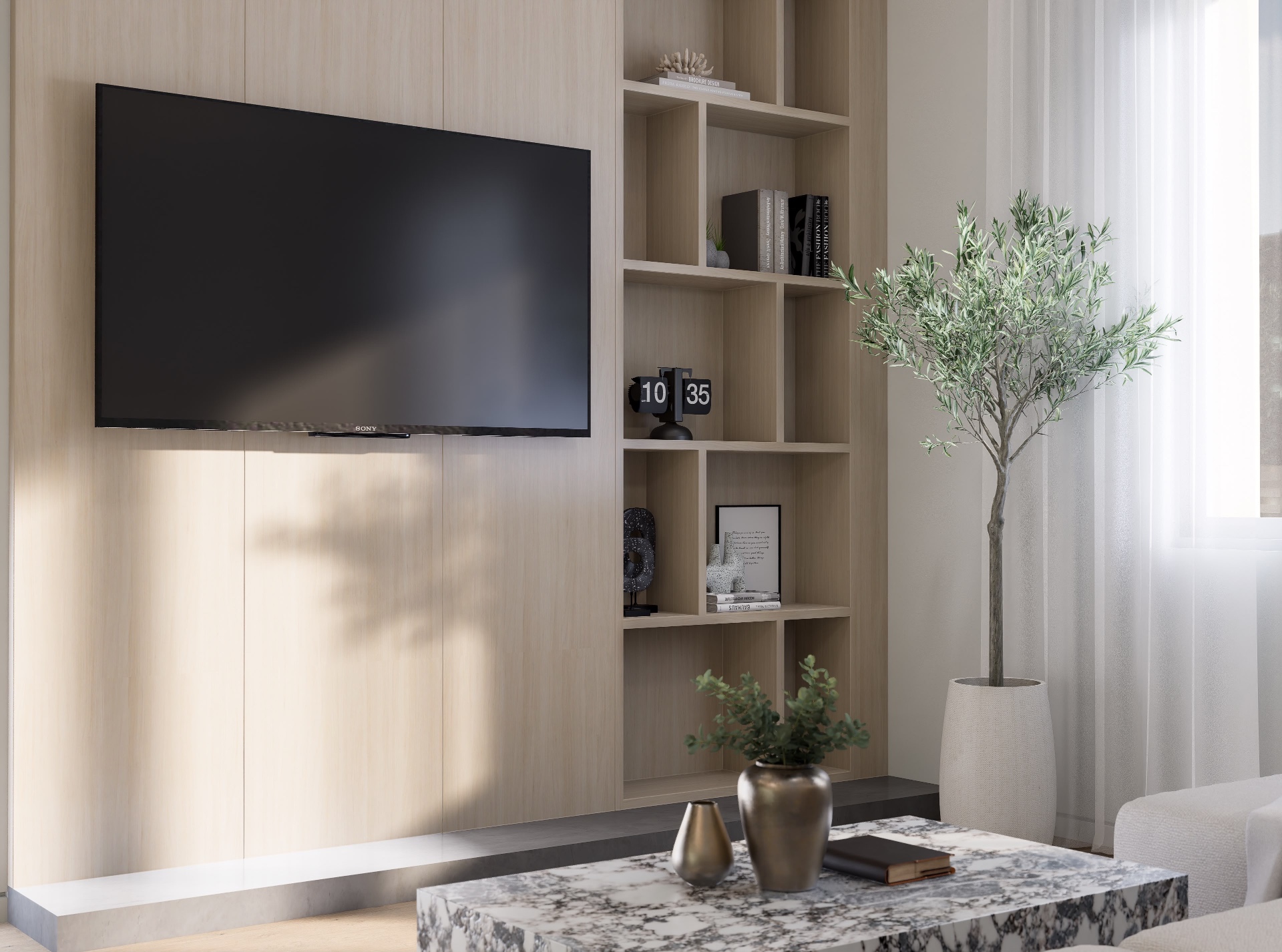 Living room media wall in pale oak with open shelving, olive tree and marble coffee table