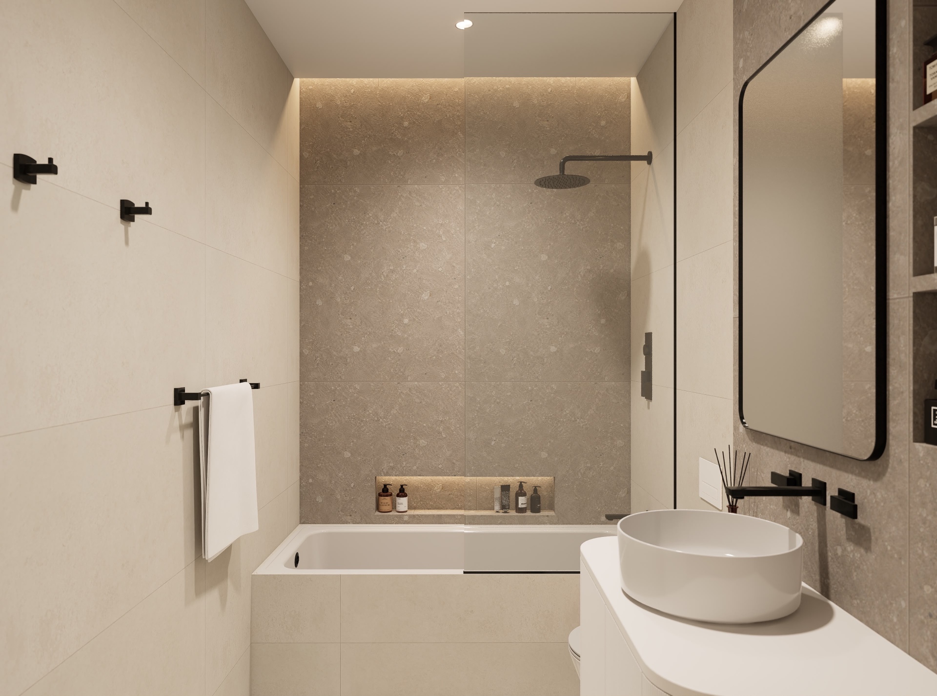 Bathroom with backlit stone tub surround, recessed shelf niche and rounded white vanity