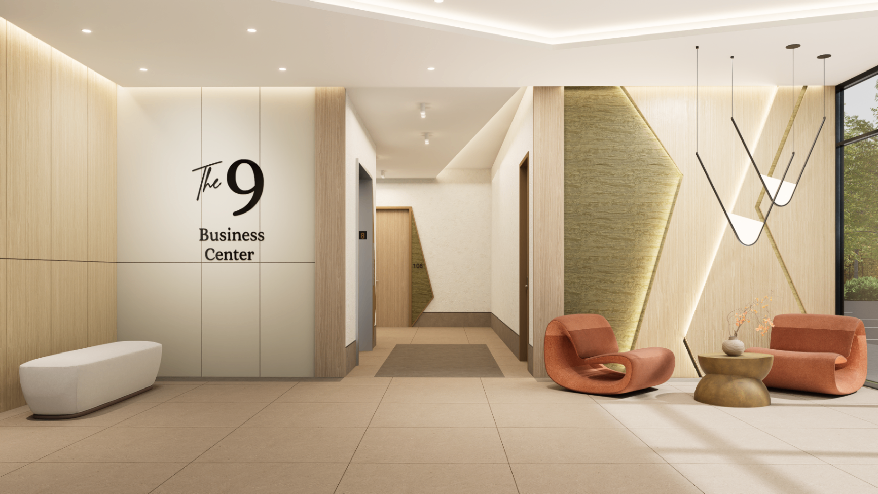 Lobby looking through to the tenant corridor with signage wall, bench and lounge seating