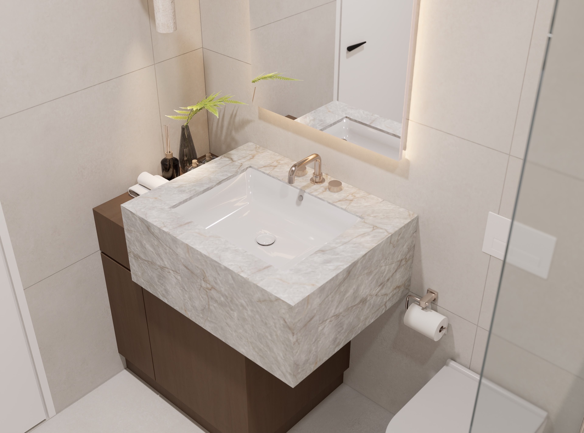 Detail of the thick marble vanity slab with undermount basin and brushed nickel fittings