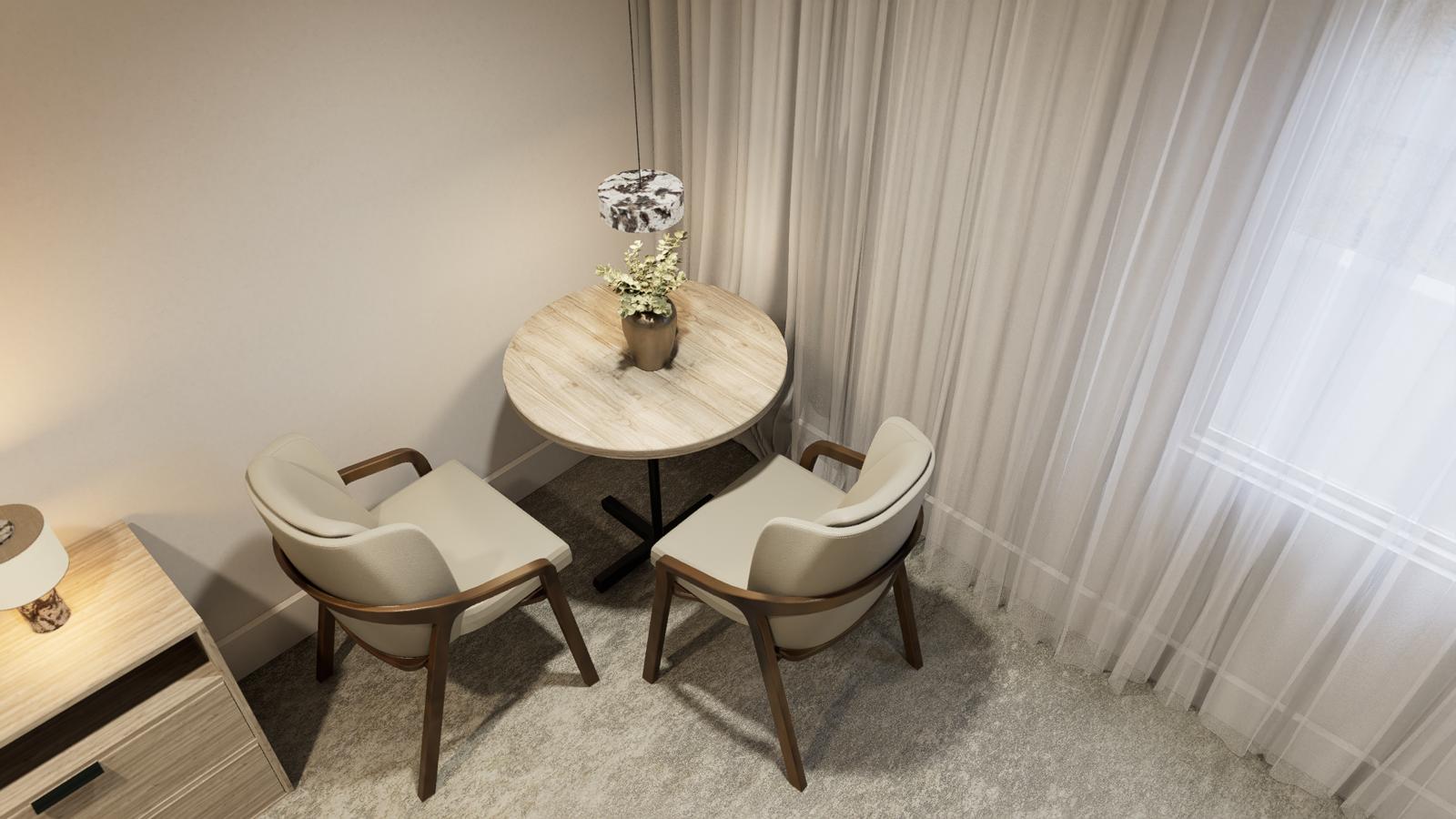 Window seating nook with round oak table, paired armchairs and a stone pendant